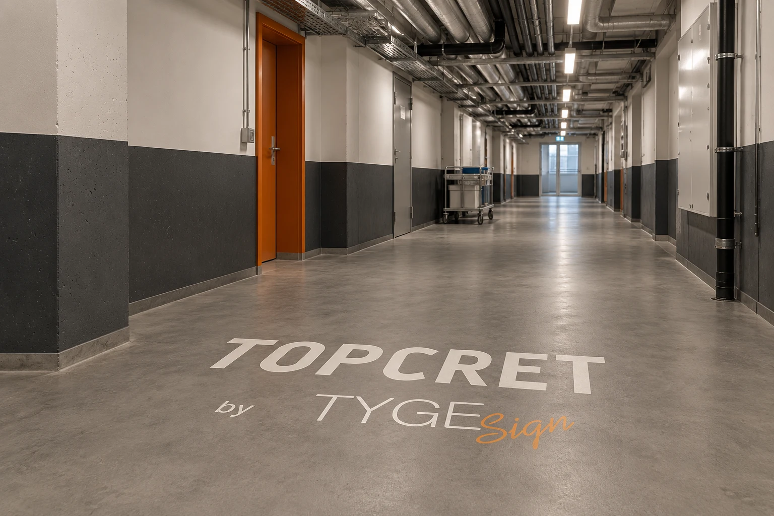 Illustrerad sjukhuskulvert med Topcret by Tygesign integrerat i en grå microcementyta